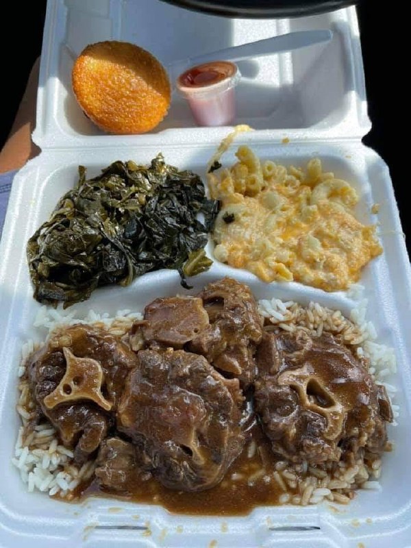 Southern smothered oxtails over rice